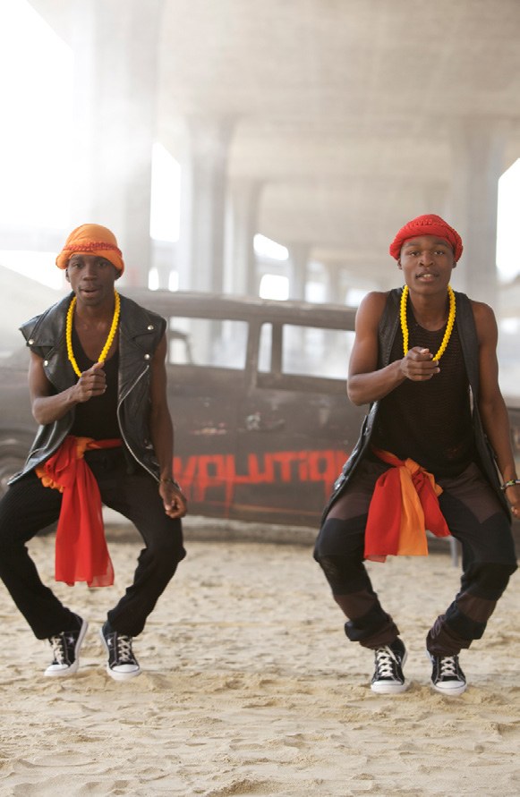 Tofo Tofo dancers Mario Buce and Xavier Campione performing kwaito pantsula movement in Maputo