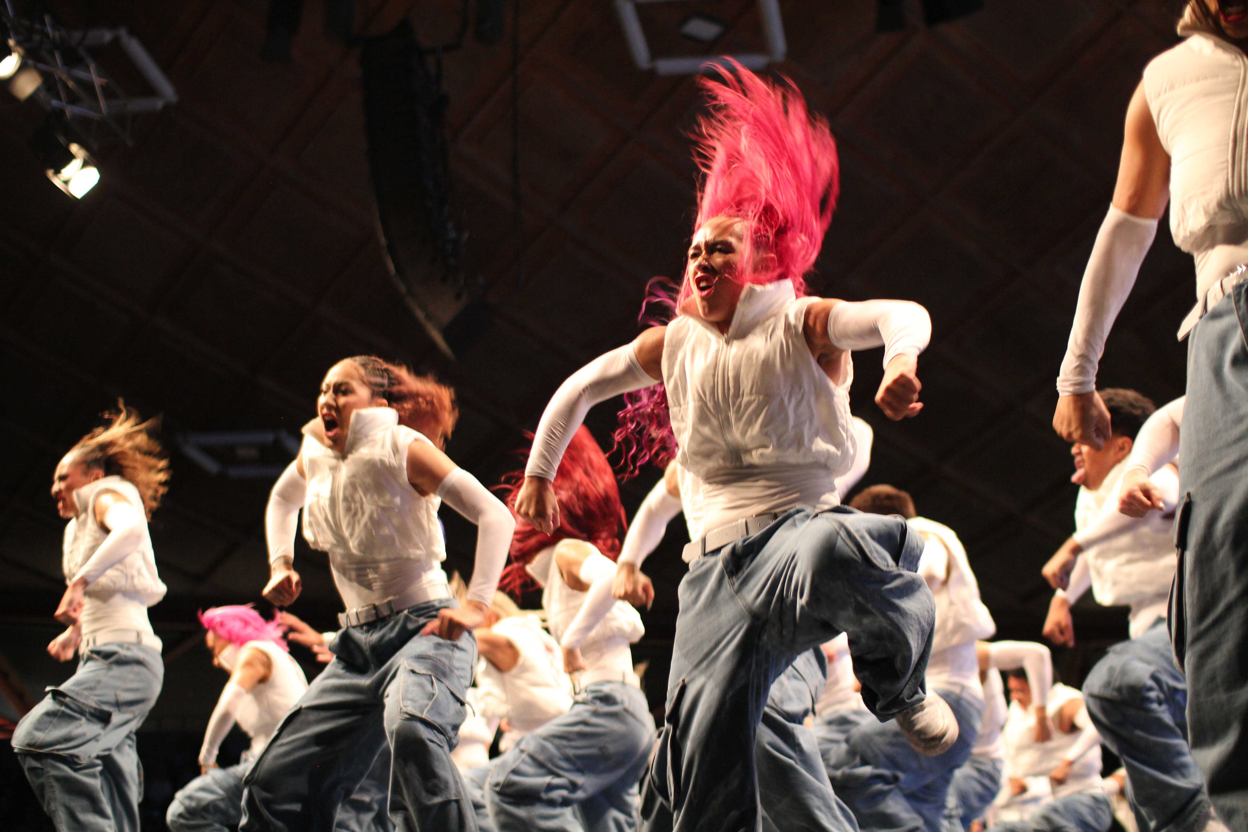 The Royal Family dance crew in white and denim performing at World Dance Crew Championship 2025